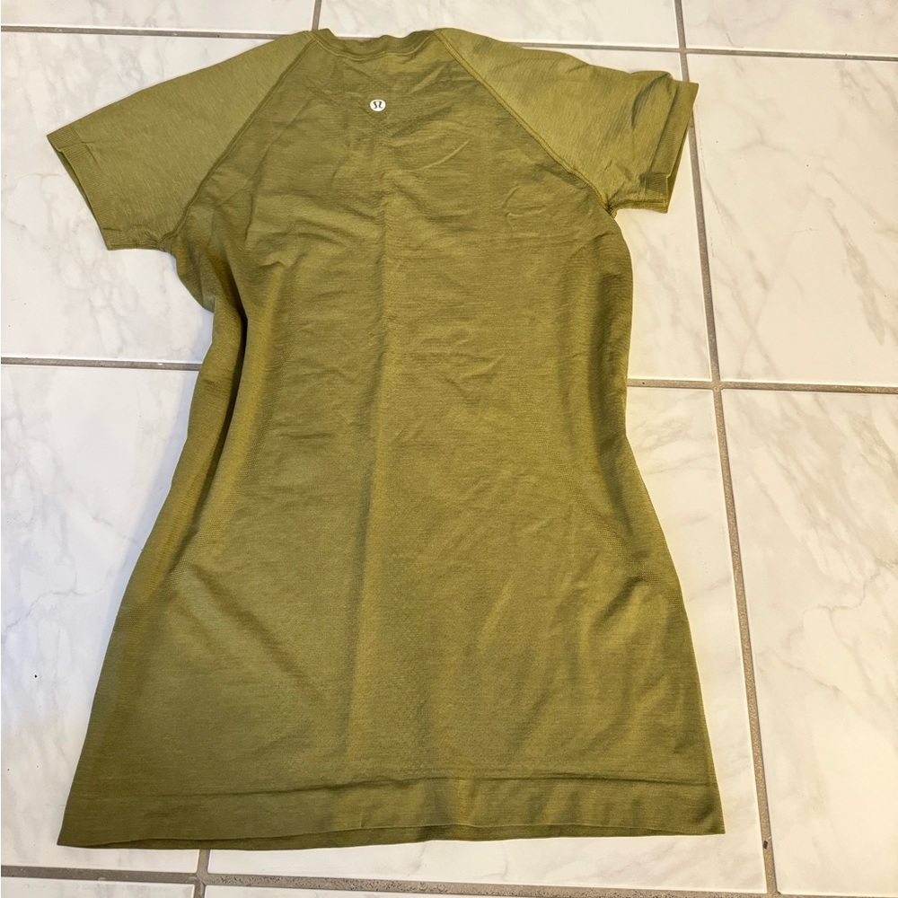 NWOT Green swiftly tech shirt